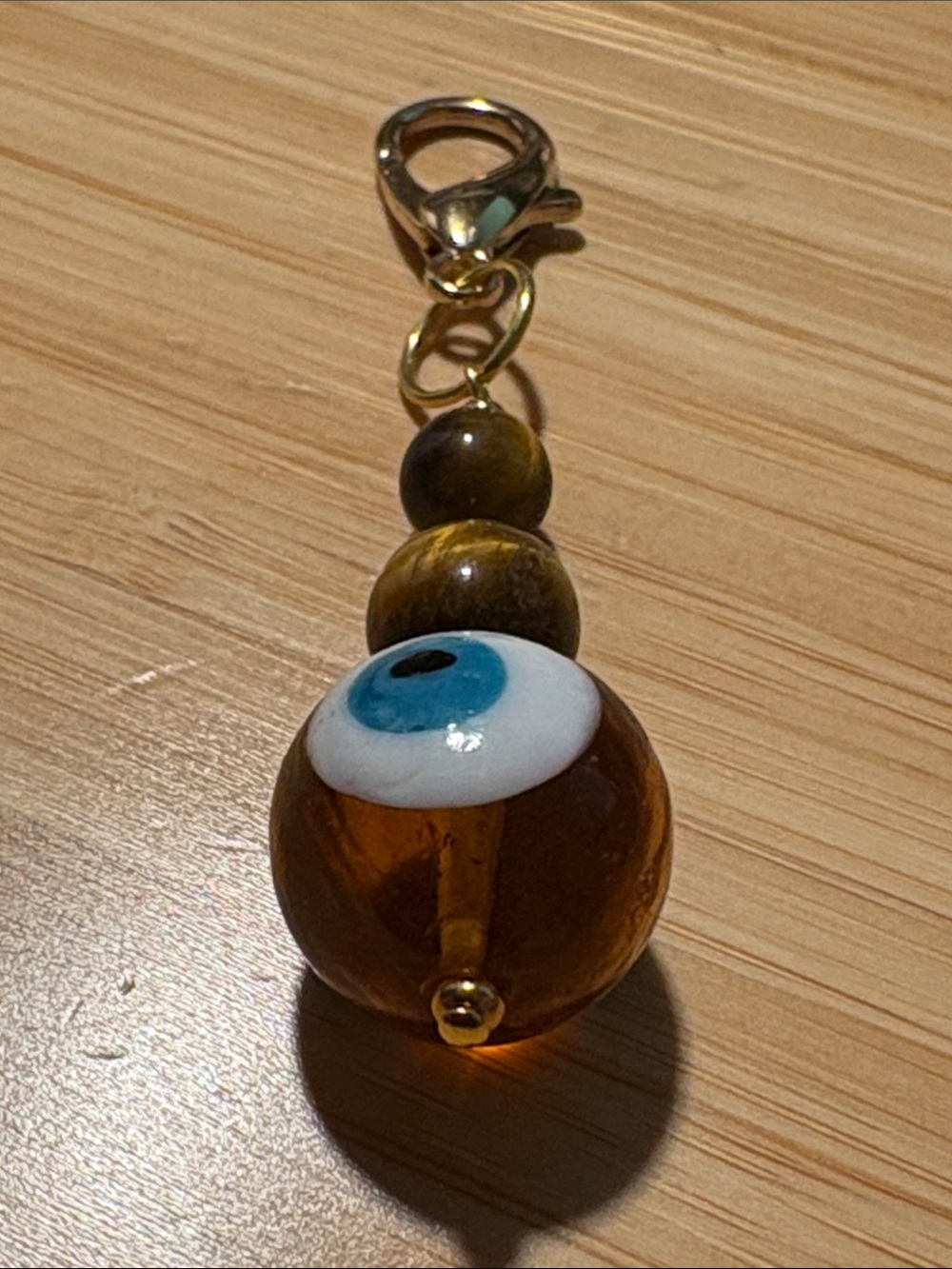 Hand Crafted Tiger’s Eye Evil Eye Glass Bead Keychain Charm in Amber & Blue - Picture 3 of 5
